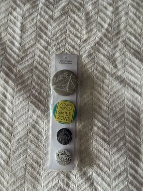 NWT 4 button pin set
